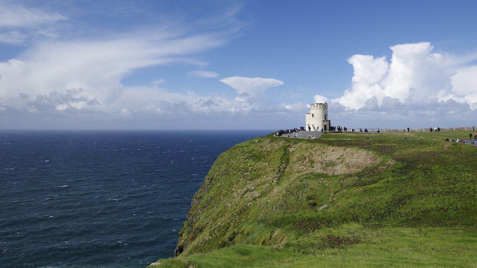O'Brien's Tower on the green clifftop above the Atlantic at the Cliffs of Moher