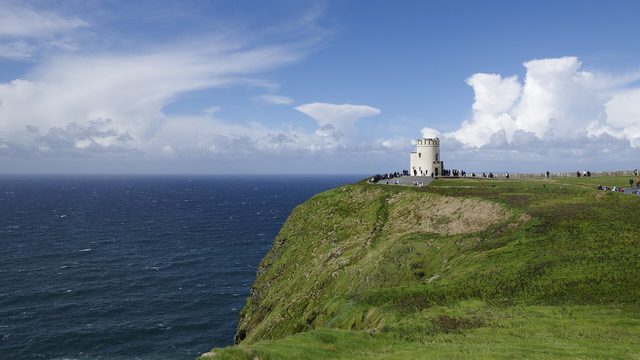 O'Brien's Tower on the green clifftop above the Atlantic at the Cliffs of Moher