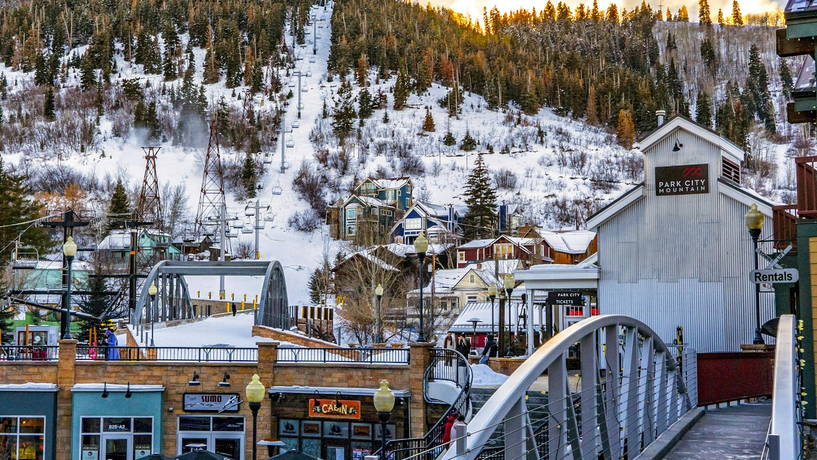 Park City with a snowy ski run on the mountain behind