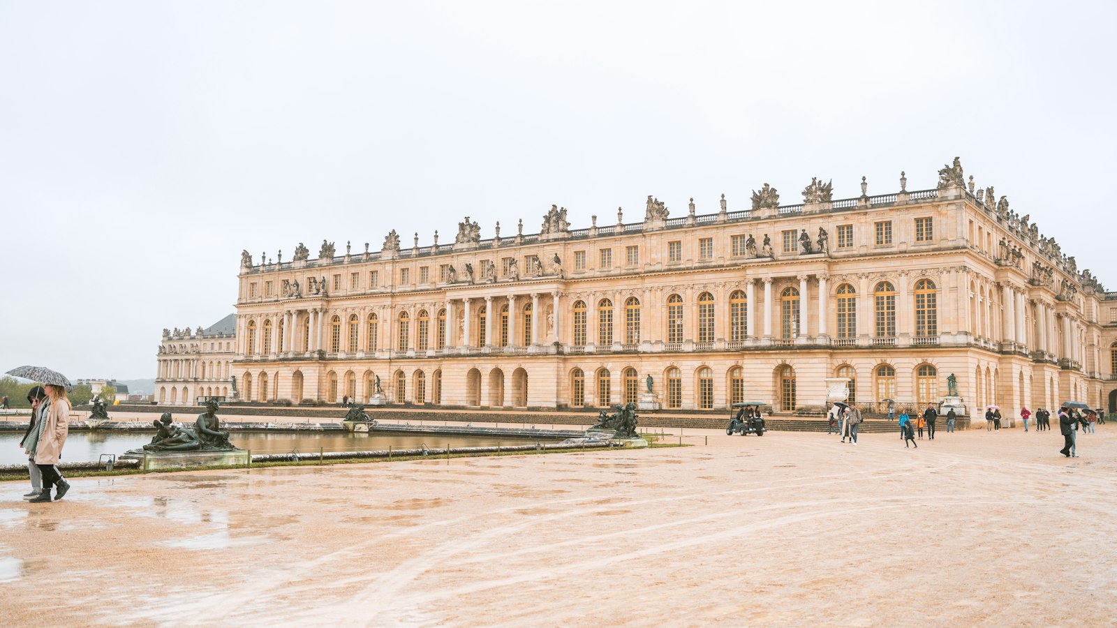 The Palace of Versailles and a fountain in spring